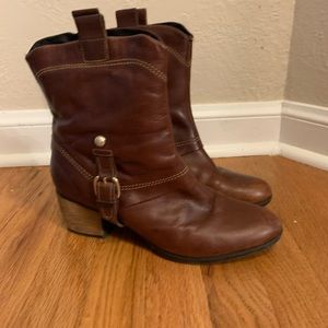 Clark’s brown leather boots.